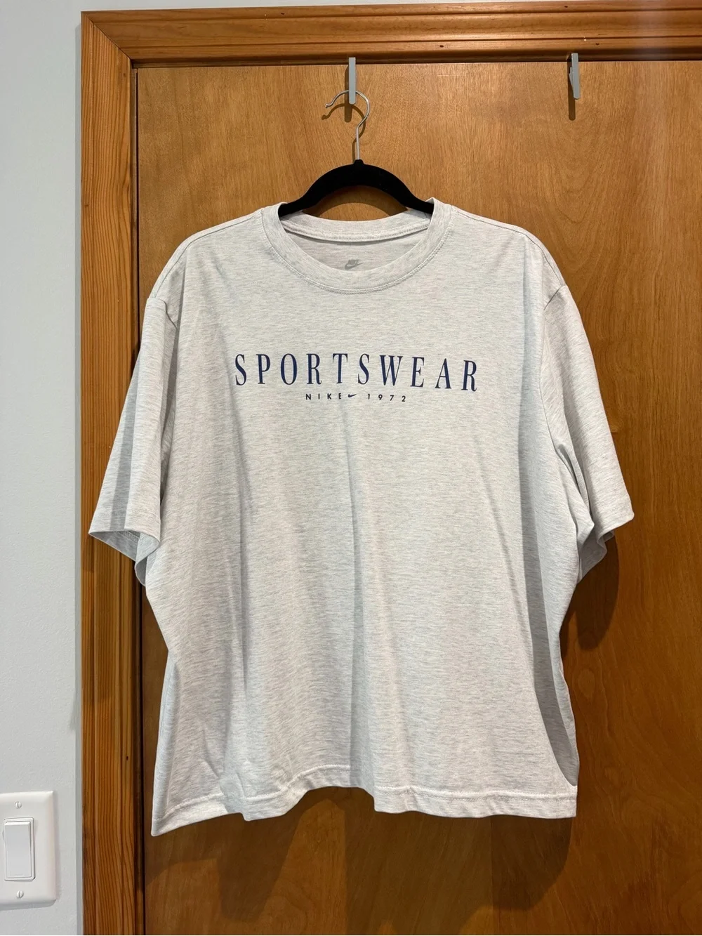 Nike Sportswear Graphic Tee with Navy Logo